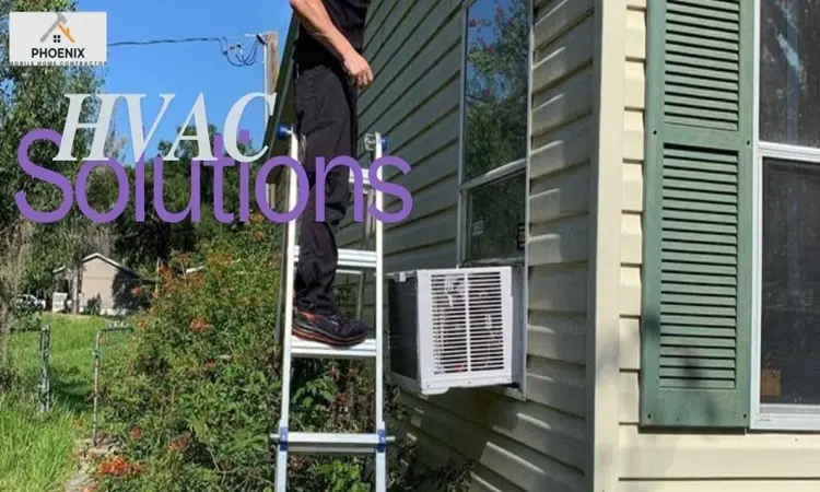 Mobile Home HVAC Solution Technician servicing window AC unit on a mobile home in Phoenix, Arizona as part of HVAC repair and cooling solutions